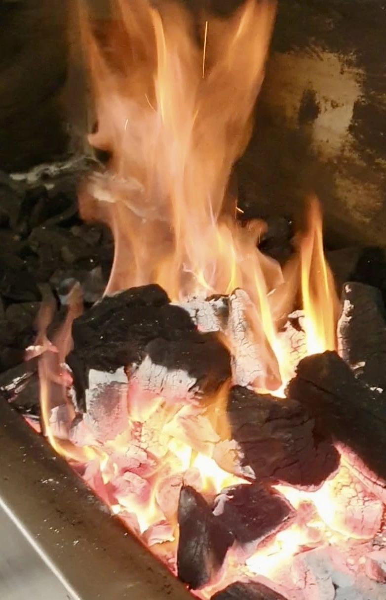Charcoal burning on a grill Paraguay charcoal 20 kg